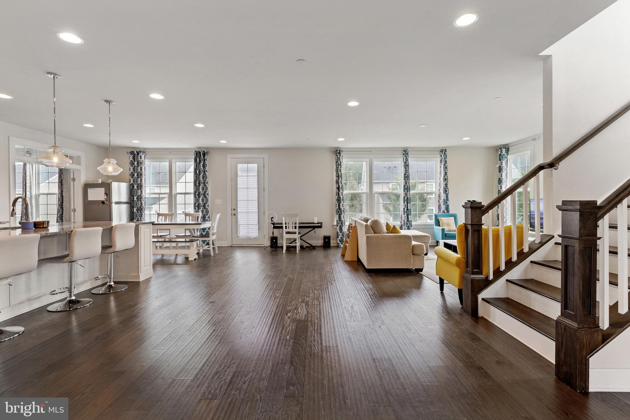 4300 Open Field Court Bowie, MD 20720 - Photo 16 of 53 a living room with furniture and a wooden floor