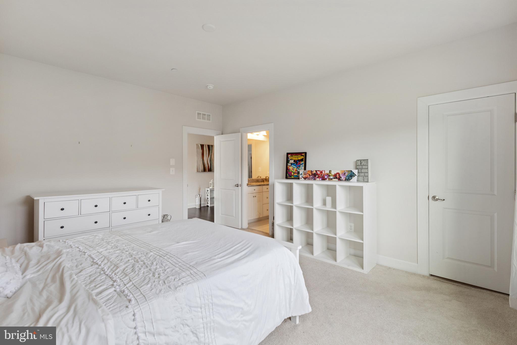 4300 Open Field Court Bowie, MD 20720 - Photo 22 of 53 a bedroom with a bed and a cabinets