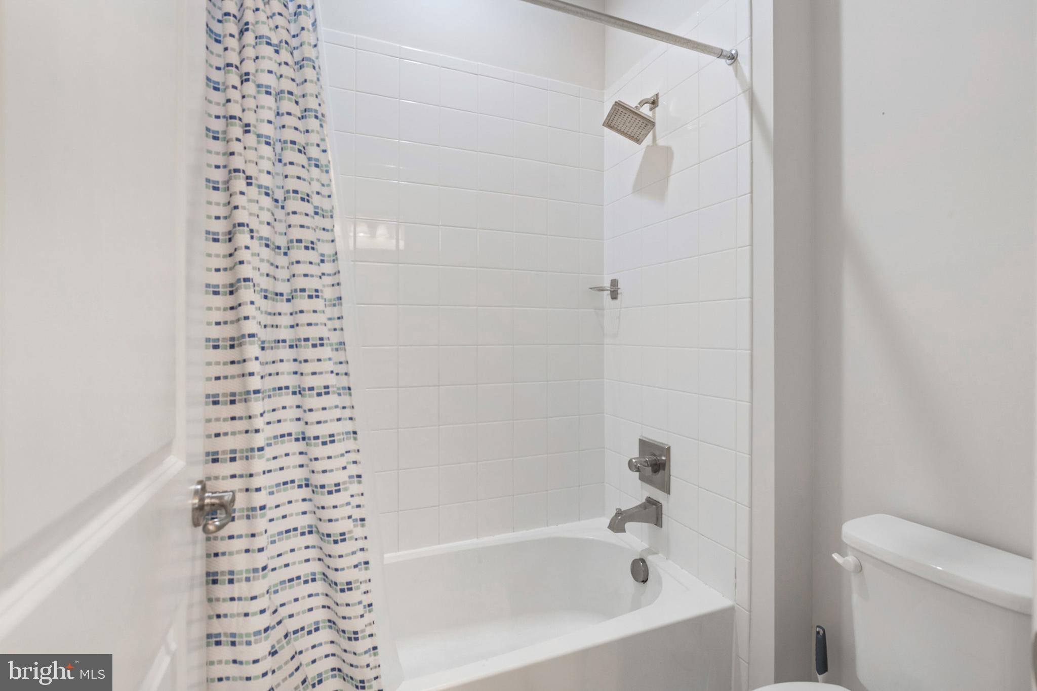 4300 Open Field Court Bowie, MD 20720 - Photo 25 of 53 a bathroom with a bathtub