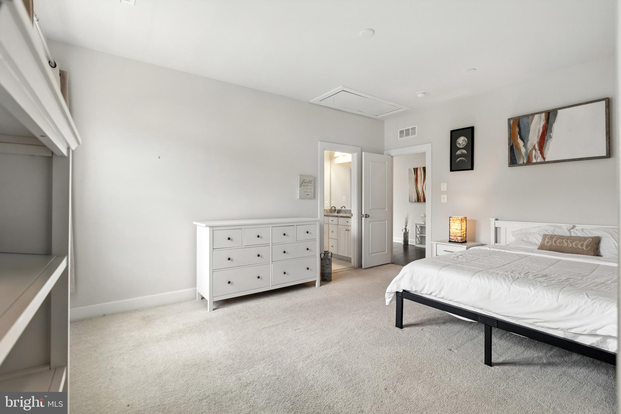 4300 Open Field Court Bowie, MD 20720 - Photo 27 of 53 a bedroom with a bed and a tv on the dresser