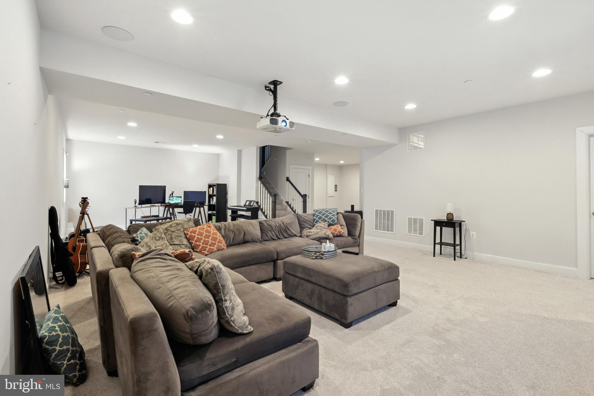 4300 Open Field Court Bowie, MD 20720 - Photo 35 of 53 a living room with furniture and a view of kitchen