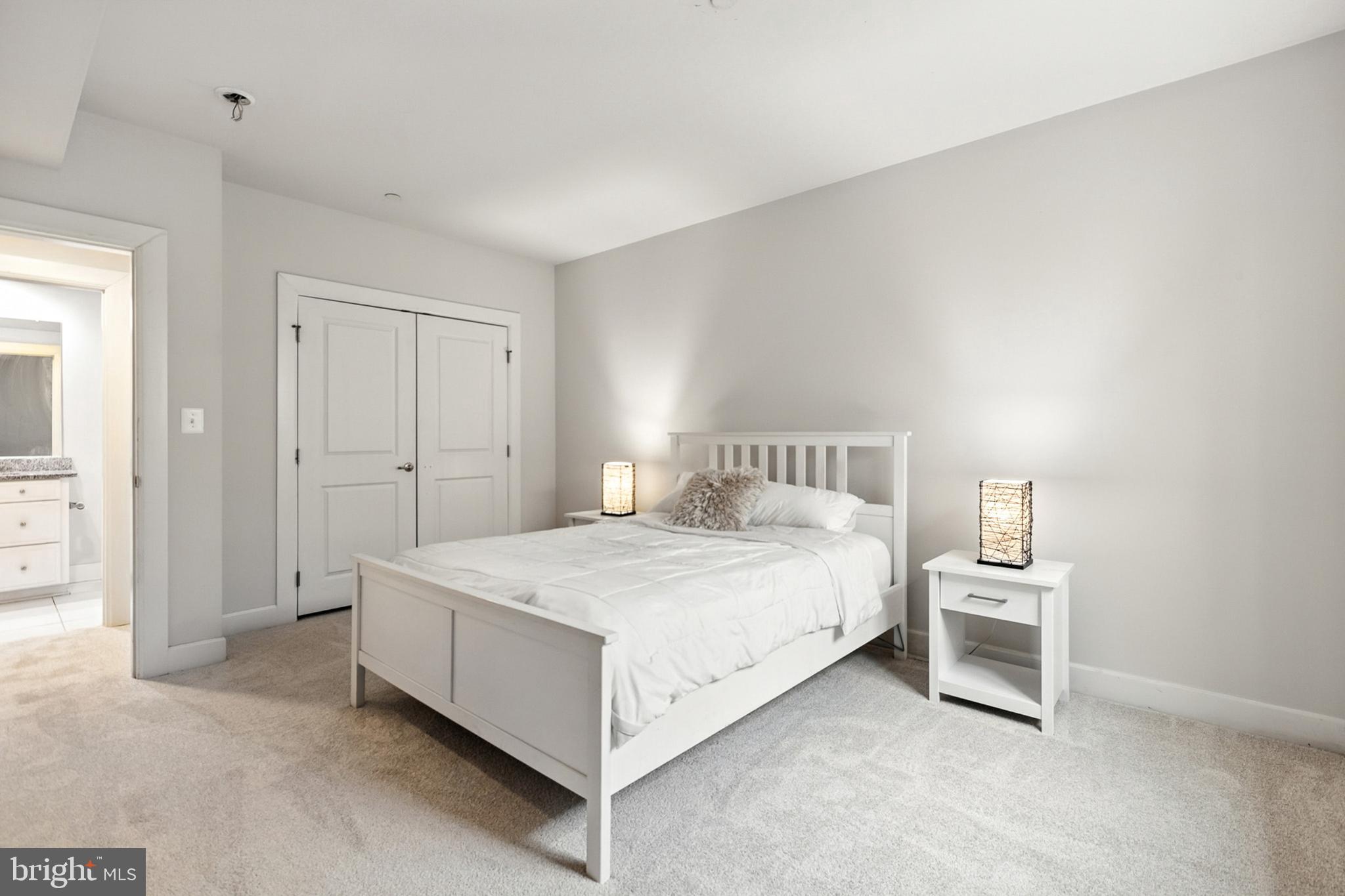 4300 Open Field Court Bowie, MD 20720 - Photo 40 of 53 a bedroom with a bed and a night stand