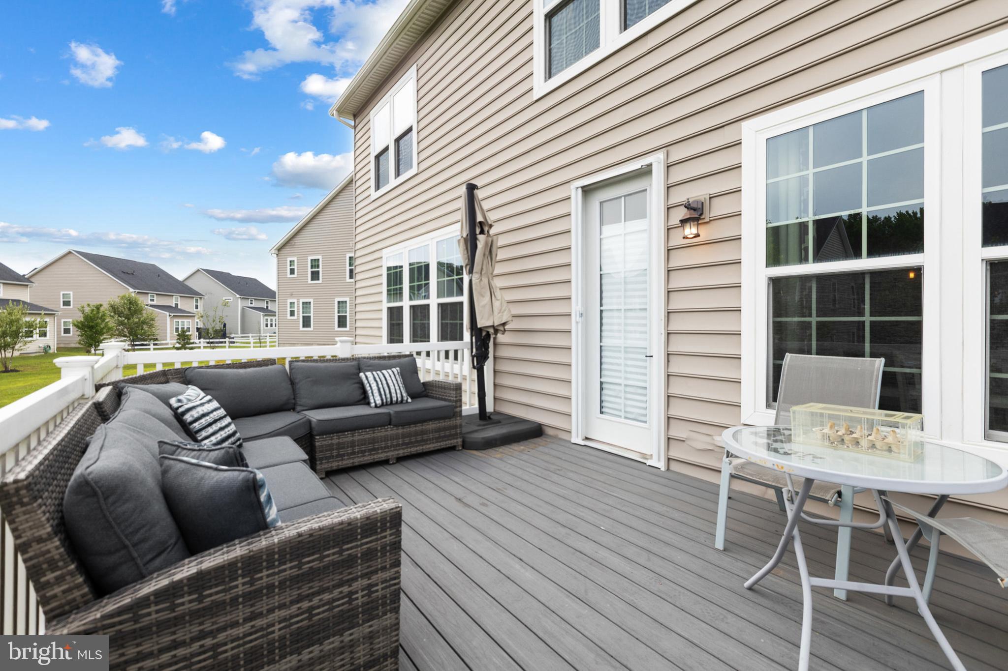 4300 Open Field Court Bowie, MD 20720 - Photo 43 of 53 a balcony with furniture and wooden floor