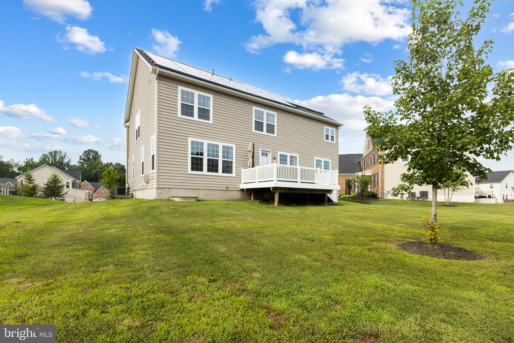4300 Open Field Court Bowie, MD 20720 - Photo 45 of 53 a view of a house with a yard