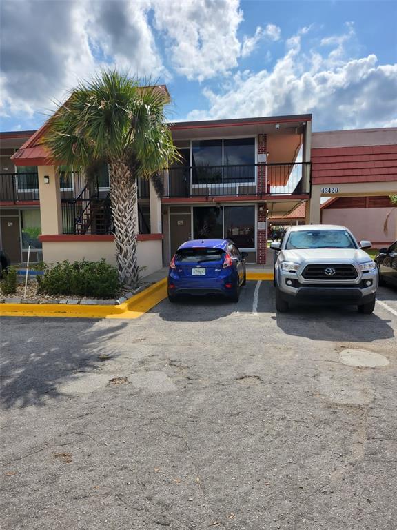 a car parked in front of a house
