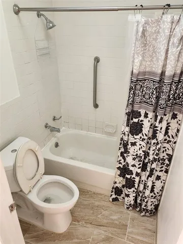 a view of a building with a ocean view