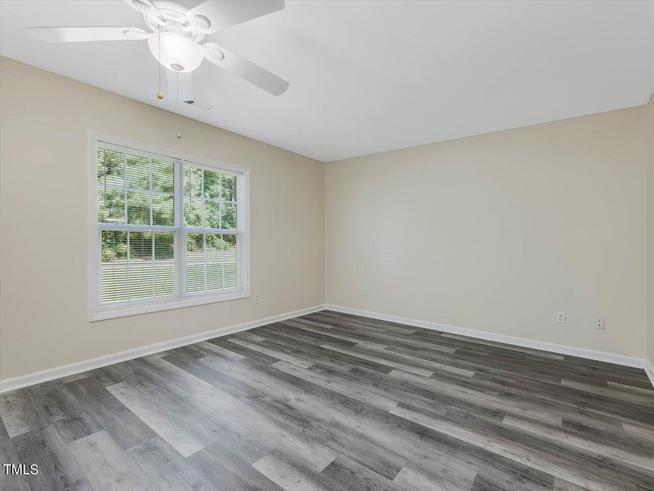 2907 Dearborn Drive Durham, NC 27704 - Photo 14 of 52 a view of an empty room with a window