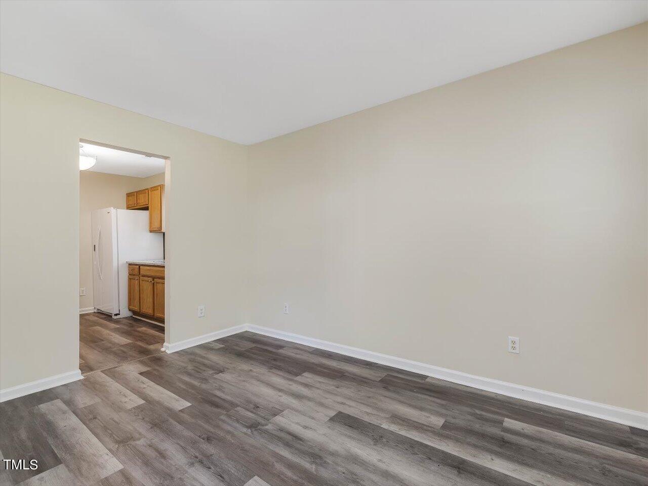 2907 Dearborn Drive Durham, NC 27704 - Photo 16 of 52 wooden floor in an empty room