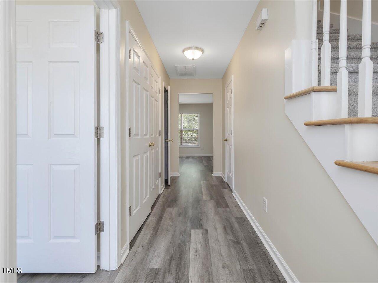 2907 Dearborn Drive Durham, NC 27704 - Photo 28 of 52 a view of a hallway with wooden floor