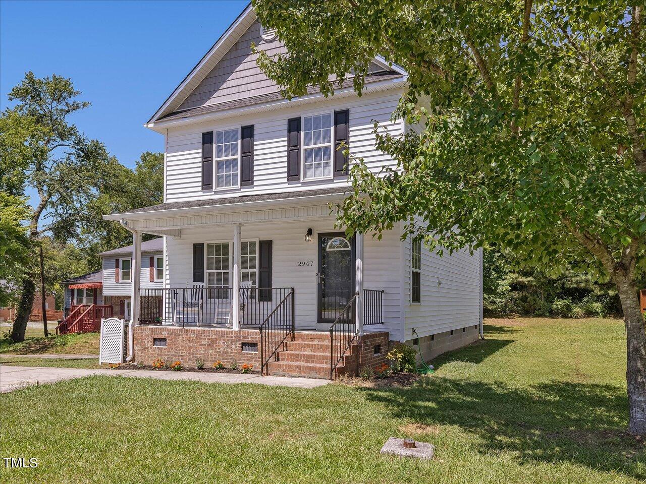 2907 Dearborn Drive Durham, NC 27704 - Photo 3 of 52 front view of a house with a yard