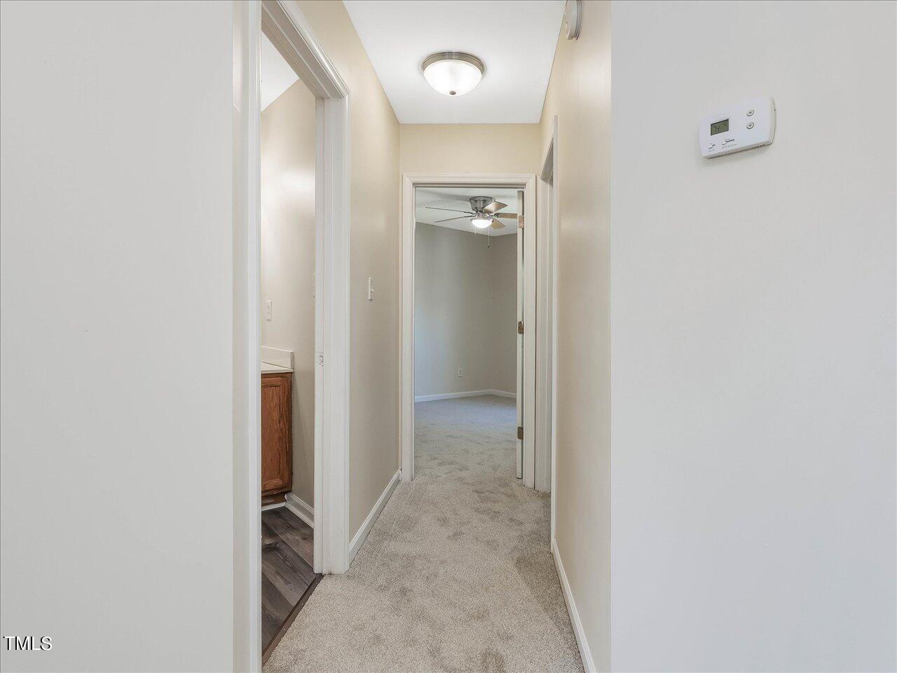 2907 Dearborn Drive Durham, NC 27704 - Photo 37 of 52 a view of a hallway with wooden floor
