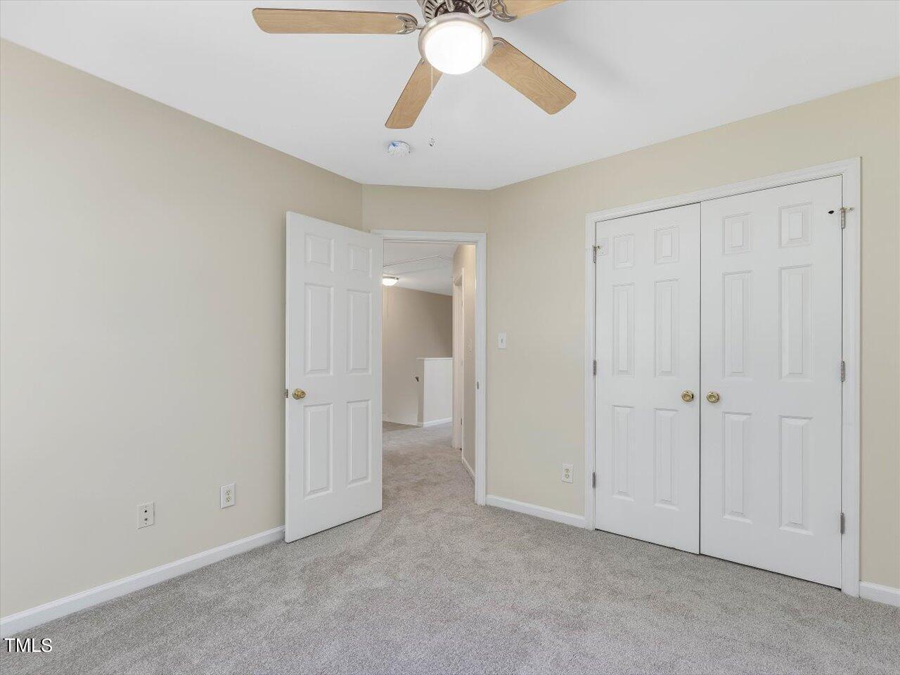 2907 Dearborn Drive Durham, NC 27704 - Photo 39 of 52 a view of an empty room and chandelier fan