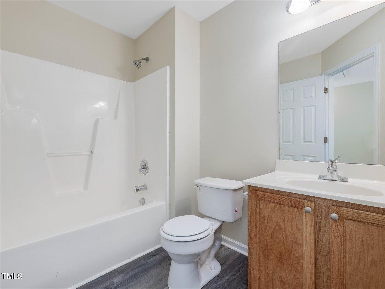2907 Dearborn Drive Durham, NC 27704 - Photo 40 of 52 a bathroom with a sink toilet and shower