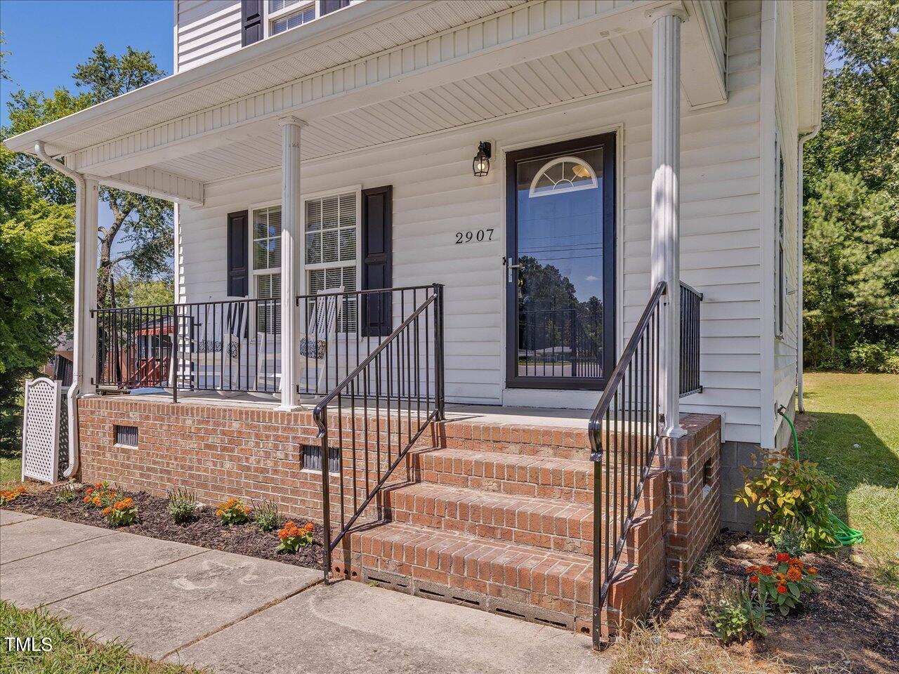 2907 Dearborn Drive Durham, NC 27704 - Photo 4 of 52 front view of a house with a porch