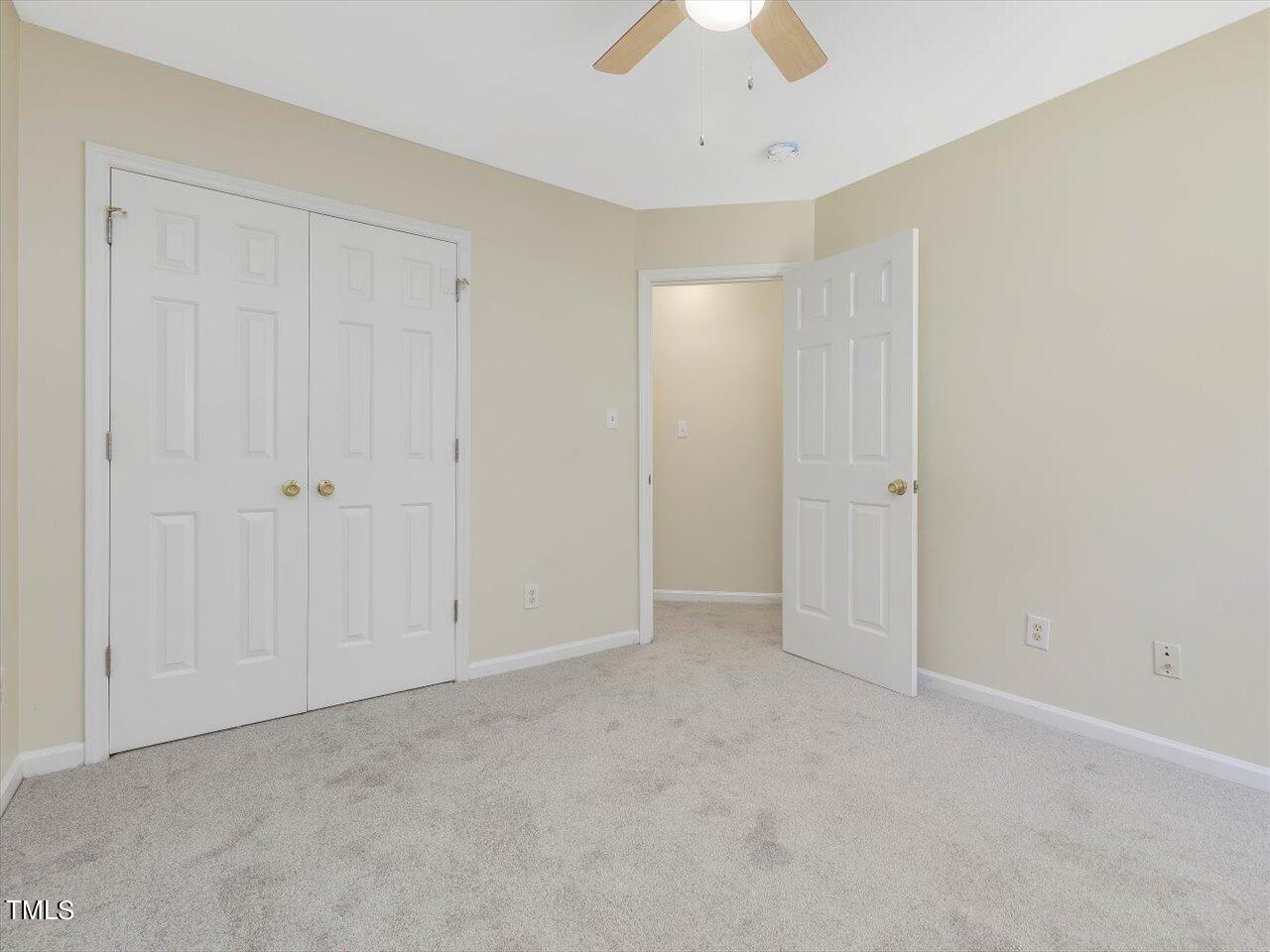 2907 Dearborn Drive Durham, NC 27704 - Photo 42 of 52 an empty room with chandelier fan
