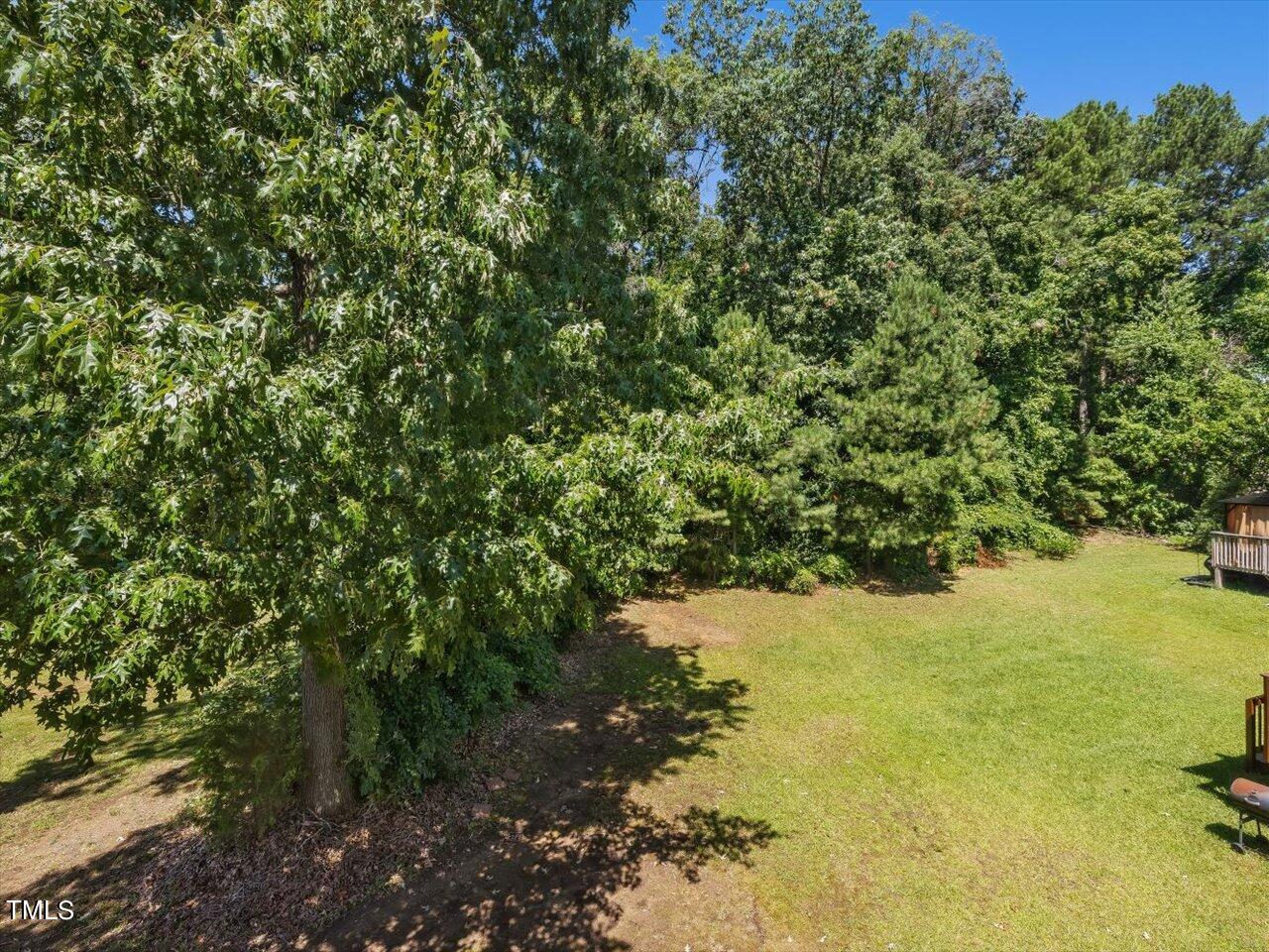 2907 Dearborn Drive Durham, NC 27704 - Photo 43 of 52 a view of a lake with a tree