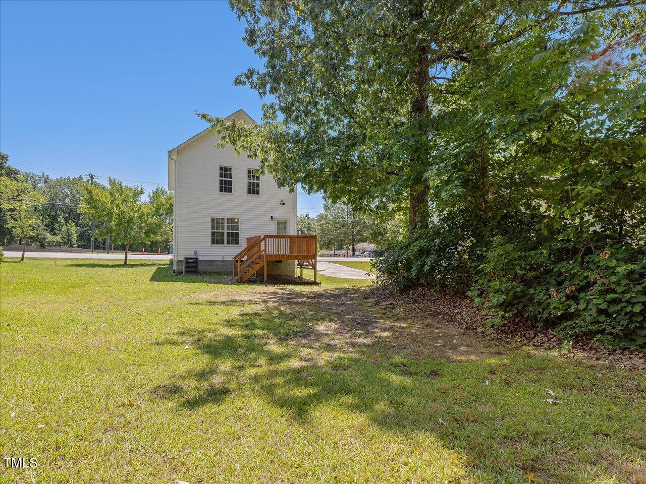 2907 Dearborn Drive Durham, NC 27704 - Photo 48 of 52 a big house with swimming pool in front of it