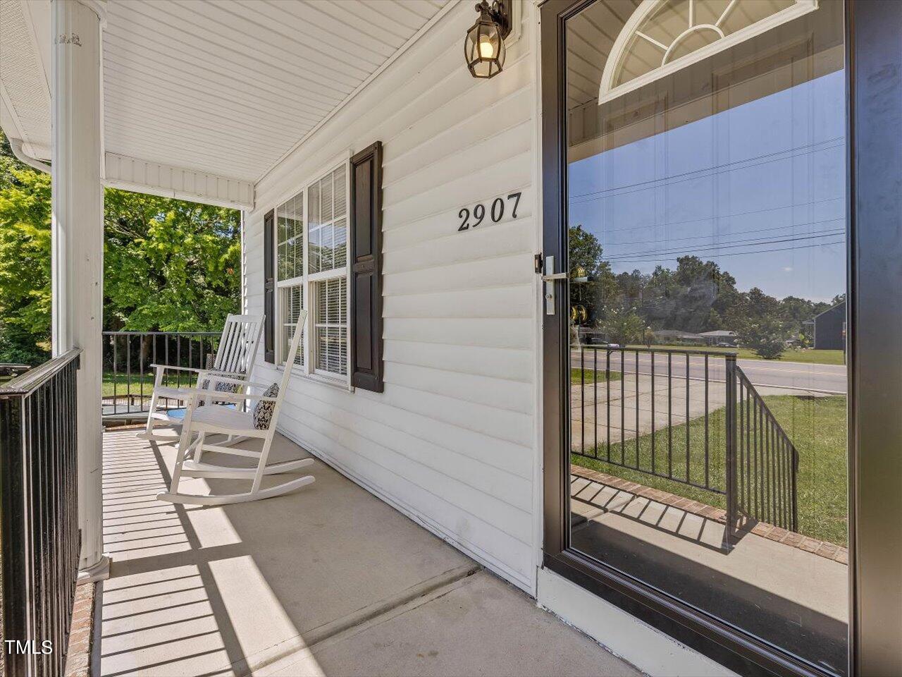 2907 Dearborn Drive Durham, NC 27704 - Photo 5 of 52 a view of a two chairs in the balcony