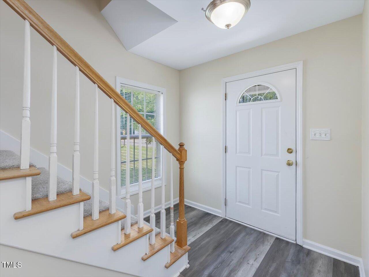 2907 Dearborn Drive Durham, NC 27704 - Photo 8 of 52 a view of entryway with wooden floor and stairs