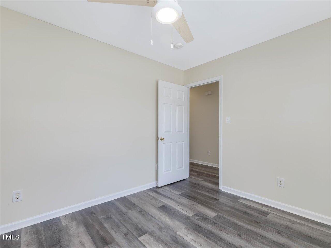 2907 Dearborn Drive Durham, NC 27704 - Photo 10 of 52 a view of an empty room with wooden floor