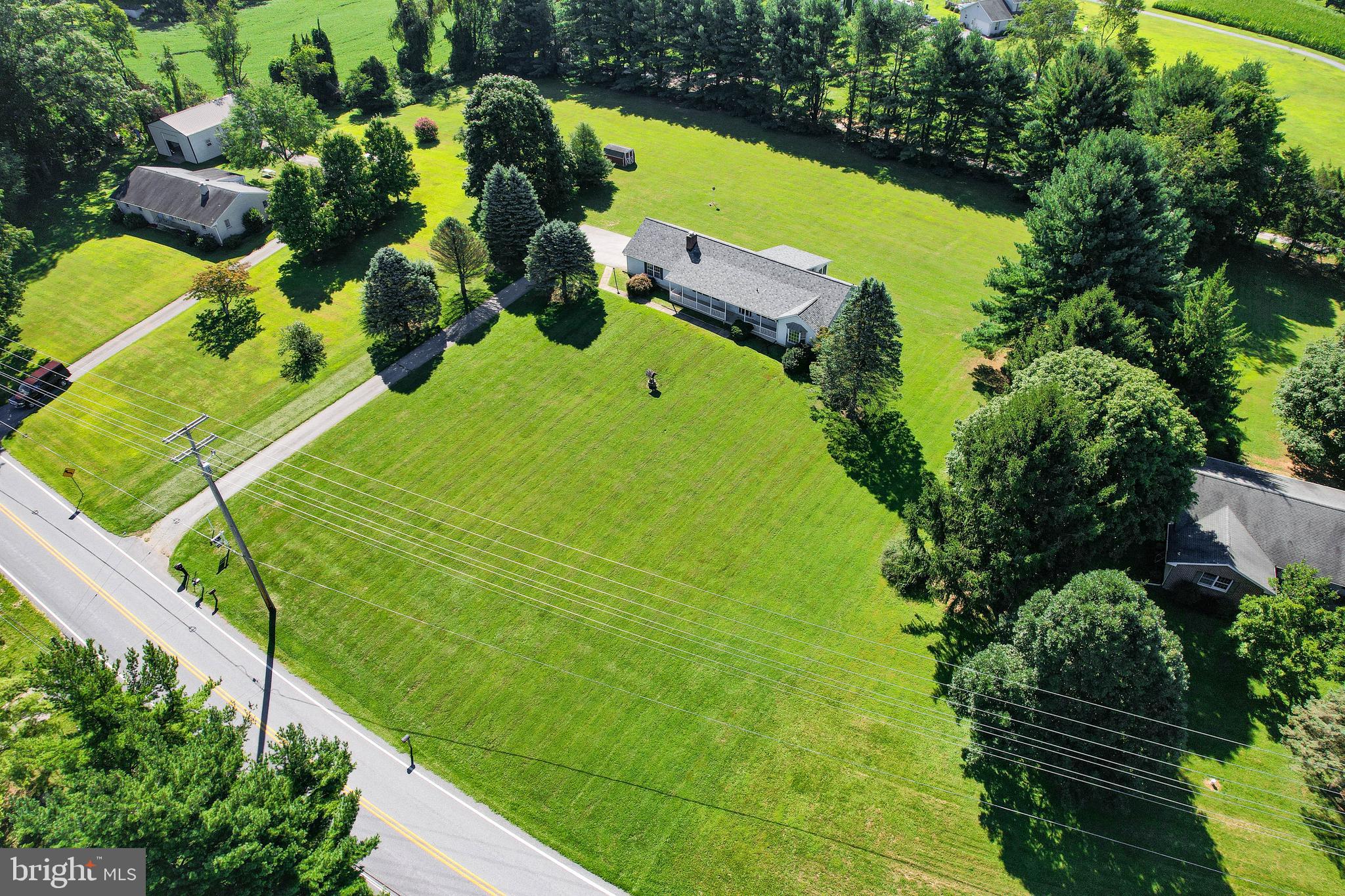 4709 Mt Carmel Road Hampstead, MD 21074 - Photo 32 of 44 a view of a swimming pool with a yard