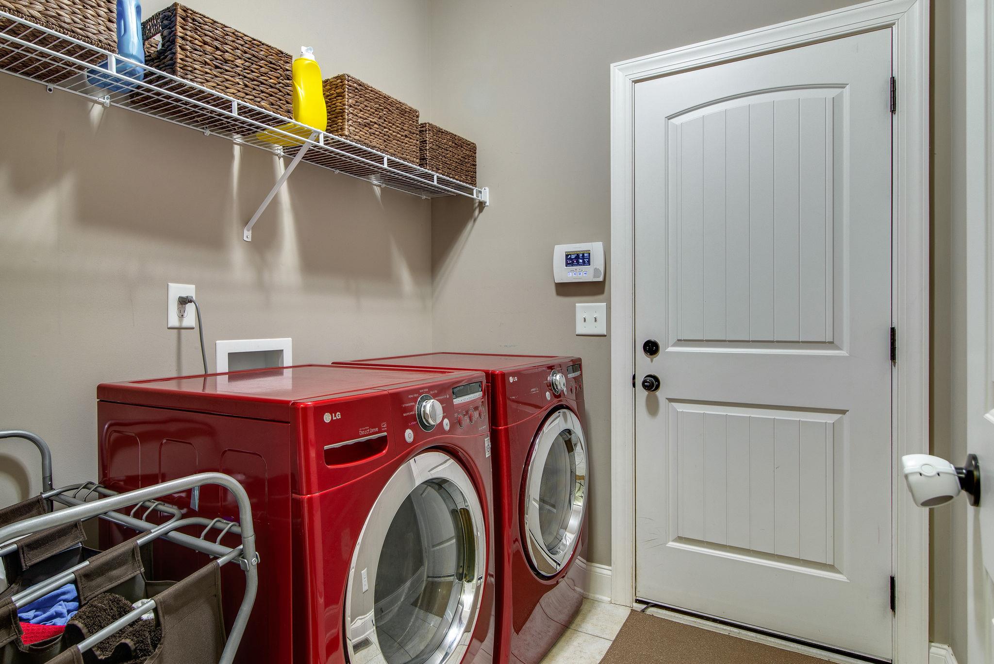 737 Harkreader Road Mount Juliet, TN 37122 - Photo 13 of 26 a utility room with dryer and washer