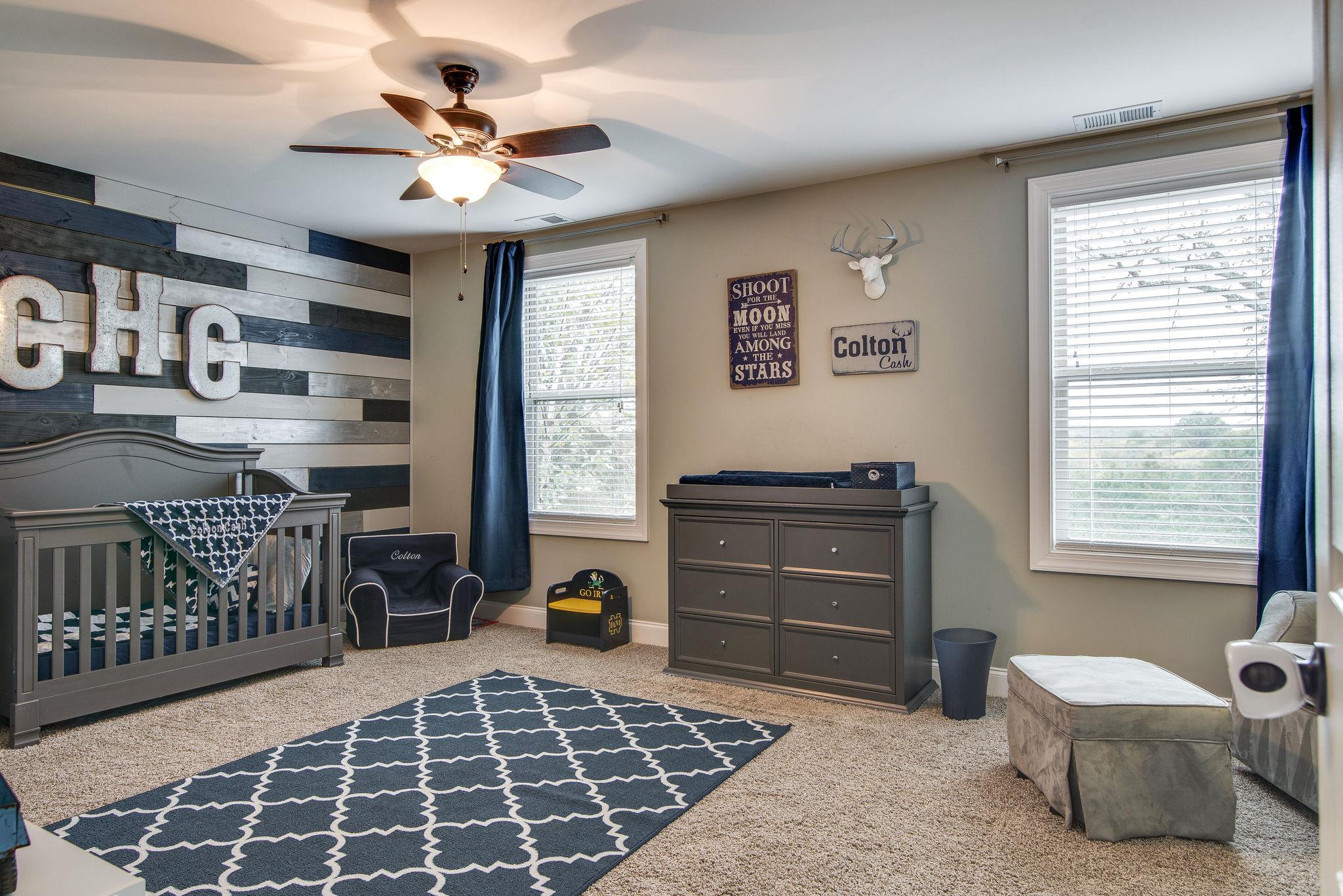 737 Harkreader Road Mount Juliet, TN 37122 - Photo 18 of 26 a bedroom with a bed and a window