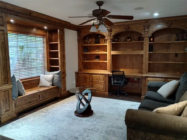 a view of cabinets and wooden floor