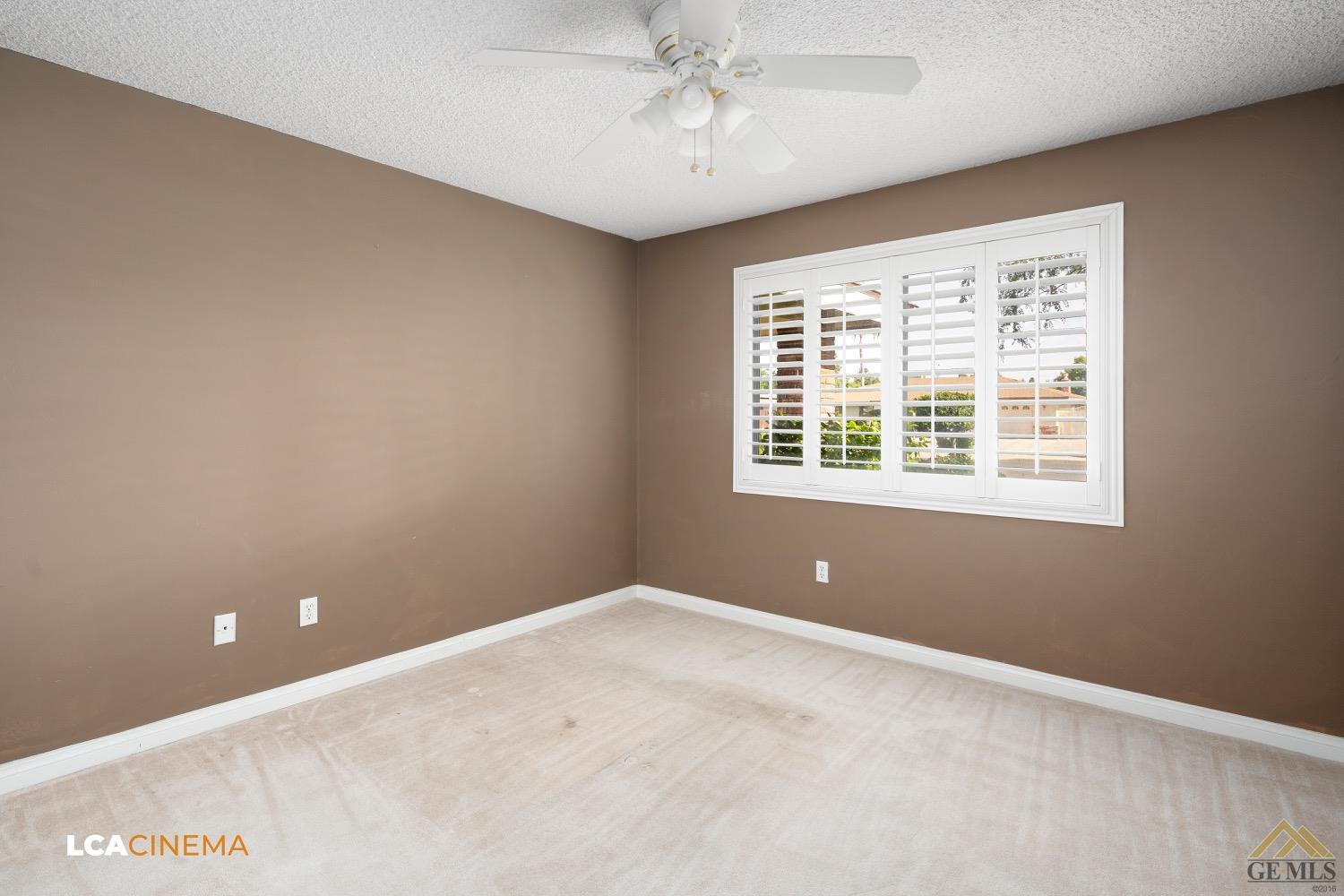 Undisclosed Address Bakersfield, CA 93308 - Photo 13 of 23 a view of an empty room with a window