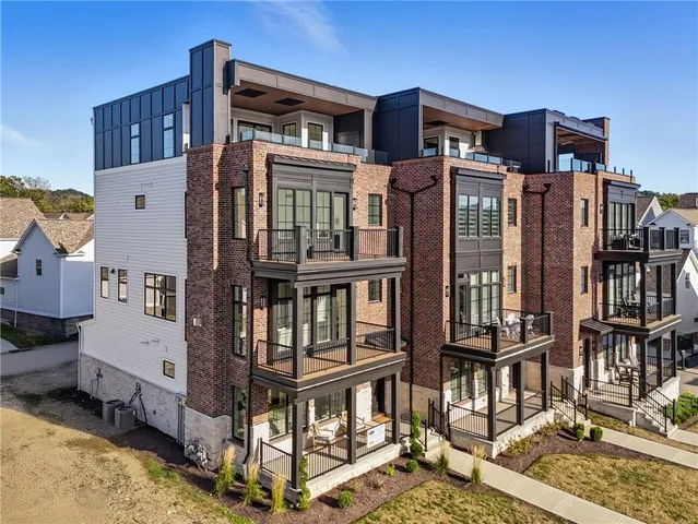 a front view of a building with glass windows