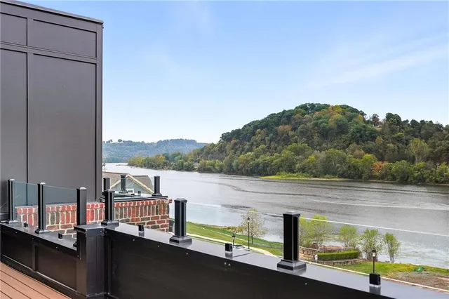 a view of a lake from a balcony