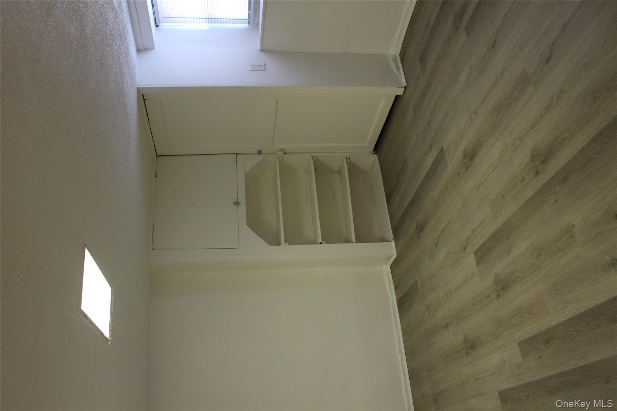 2973 Harding Avenue Bronx, NY 10465 - Photo 13 of 27 Basement with light wood-style flooring and baseboards