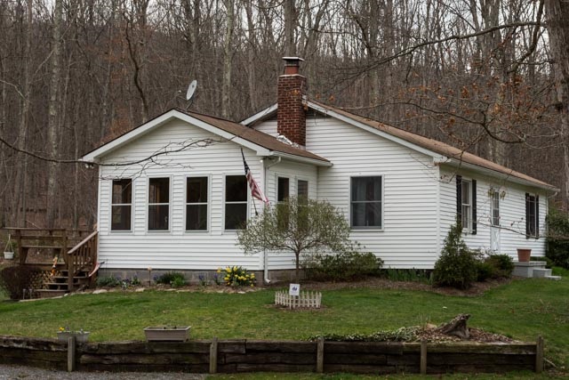 2146 Strawderman Road Mathias, WV 26812 - Photo 12 of 20 a front view of a house with a yard