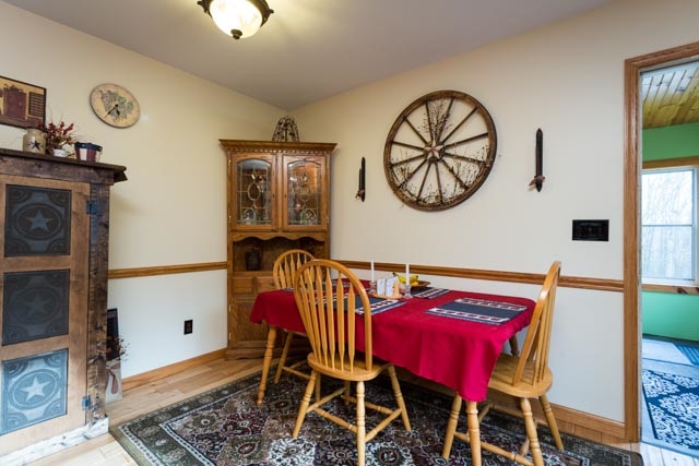 2146 Strawderman Road Mathias, WV 26812 - Photo 4 of 20 a view of a dining area with furniture and chandelier