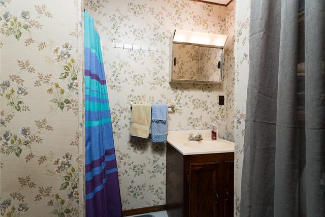2146 Strawderman Road Mathias, WV 26812 - Photo 9 of 20 a bathroom with a sink and a mirror
