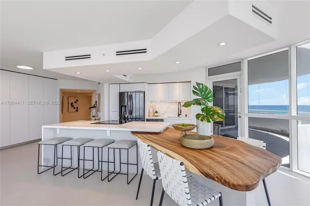 a view of a living room with a large window
