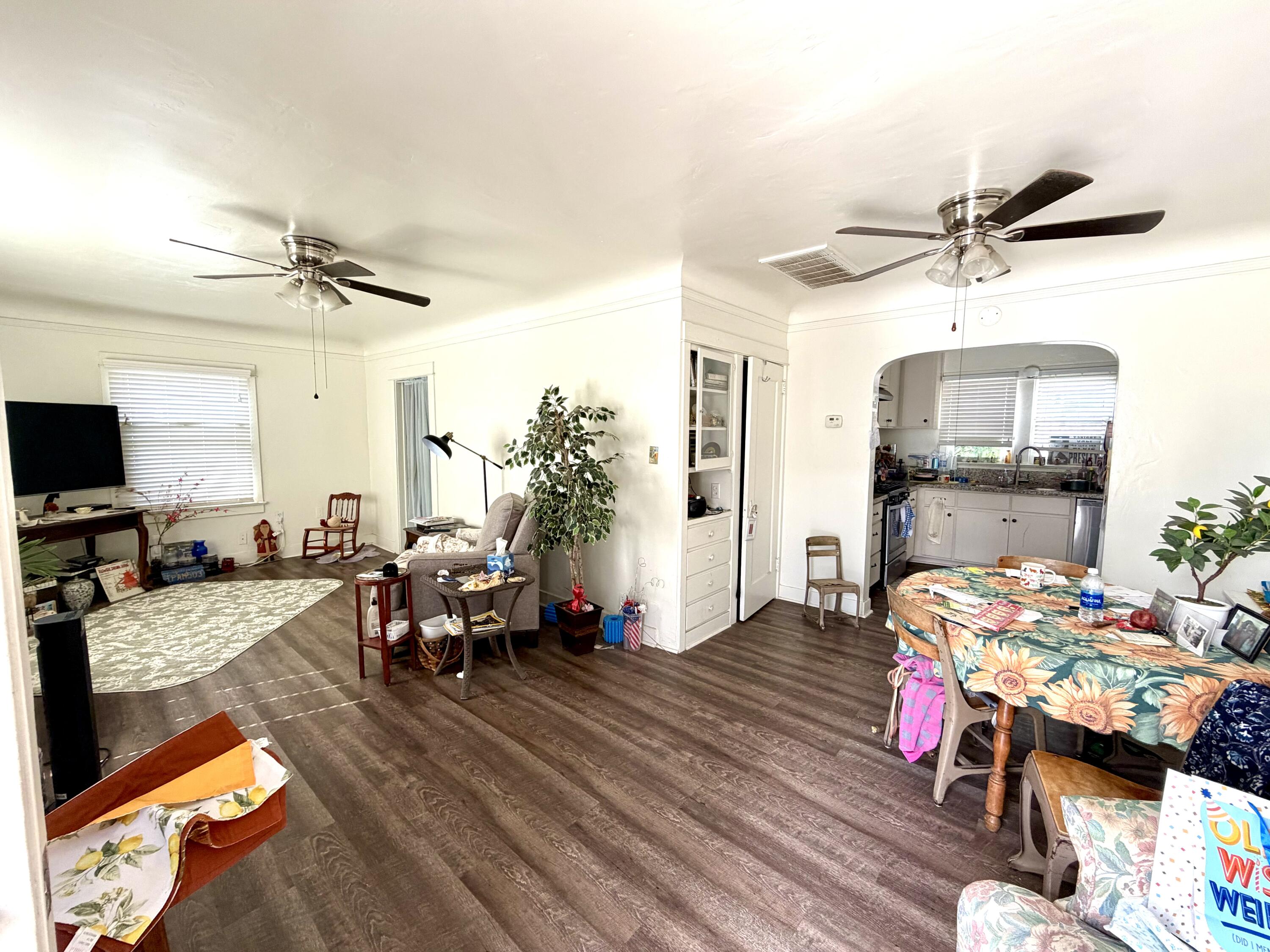 200 North B Street Exeter, CA 93221 - Photo 12 of 20 a living room with furniture and a flat screen tv