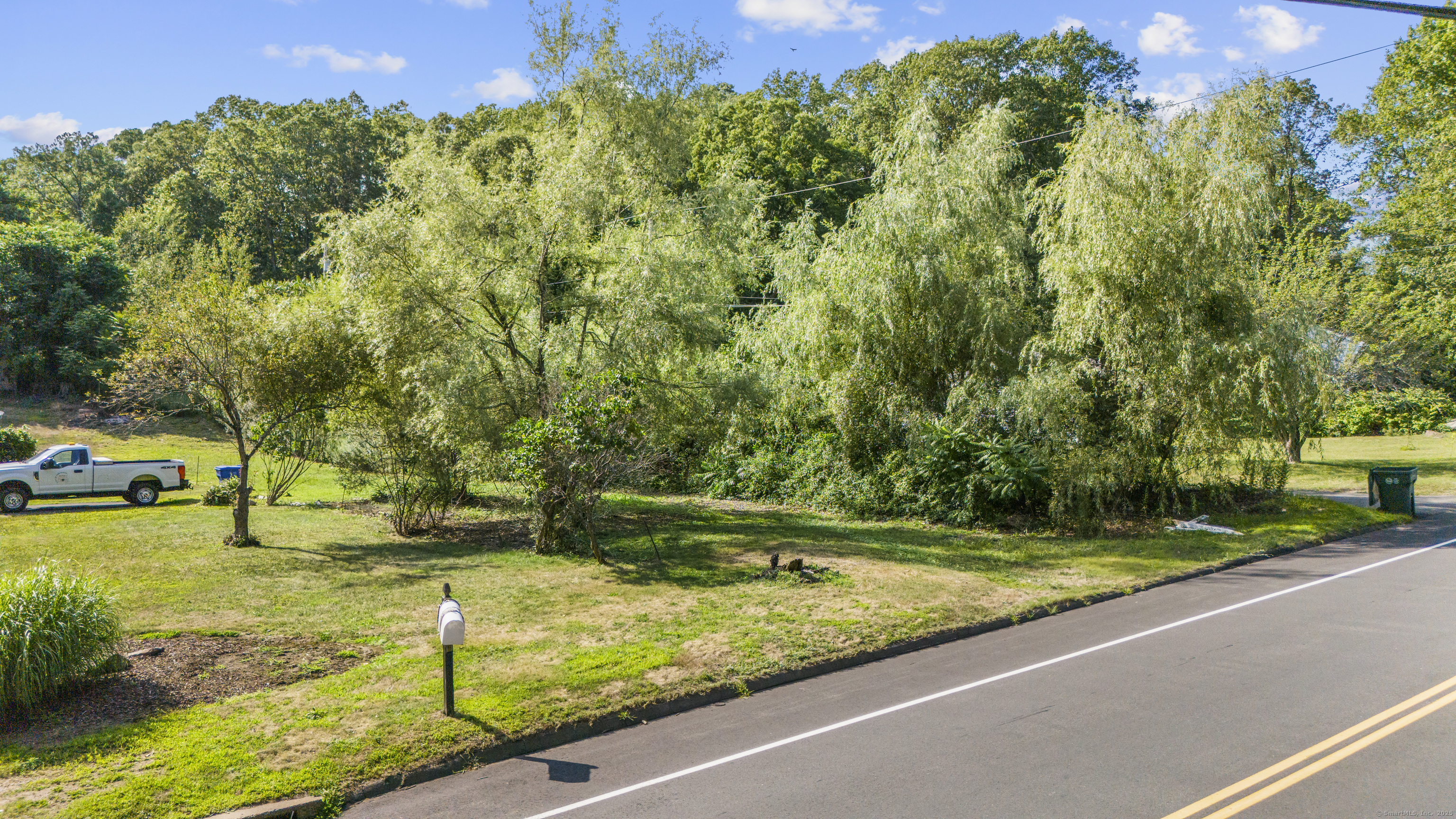 1378 Shepard Avenue Hamden, CT 06518 - Photo 8 of 15 a view of a yard with large trees