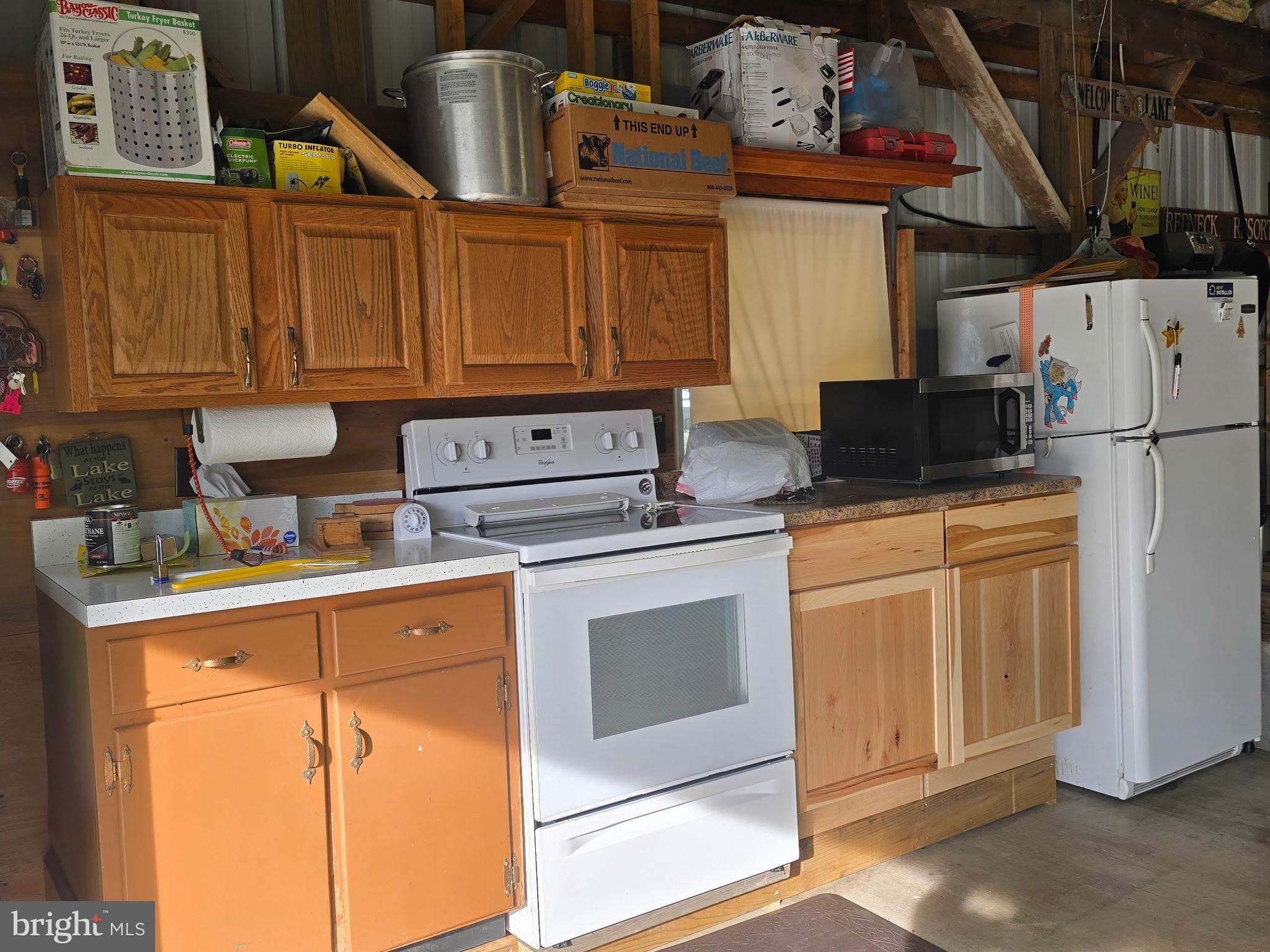700 Paul Stahl Road Mount Storm, WV 26739 - Photo 25 of 31 Rustic kitchen with modern appliances.