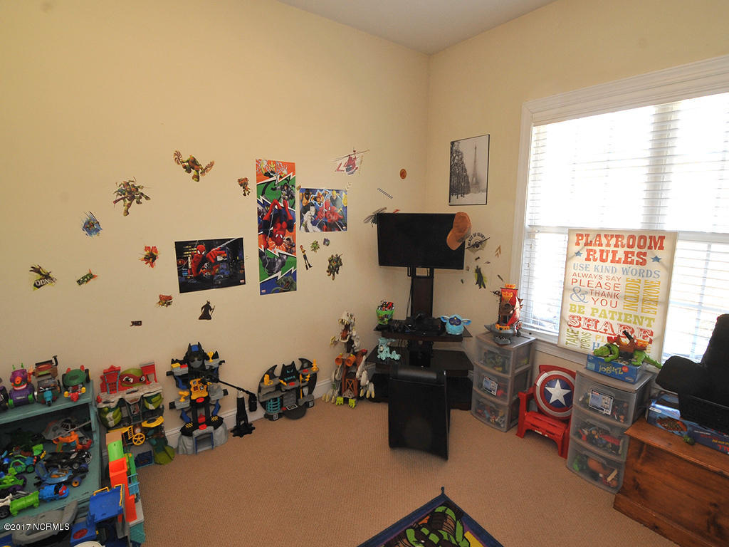 207 Contrail Road Hampstead, NC 28443 - Photo 13 of 21 207 Contrail- Maverick's playroom-BR3