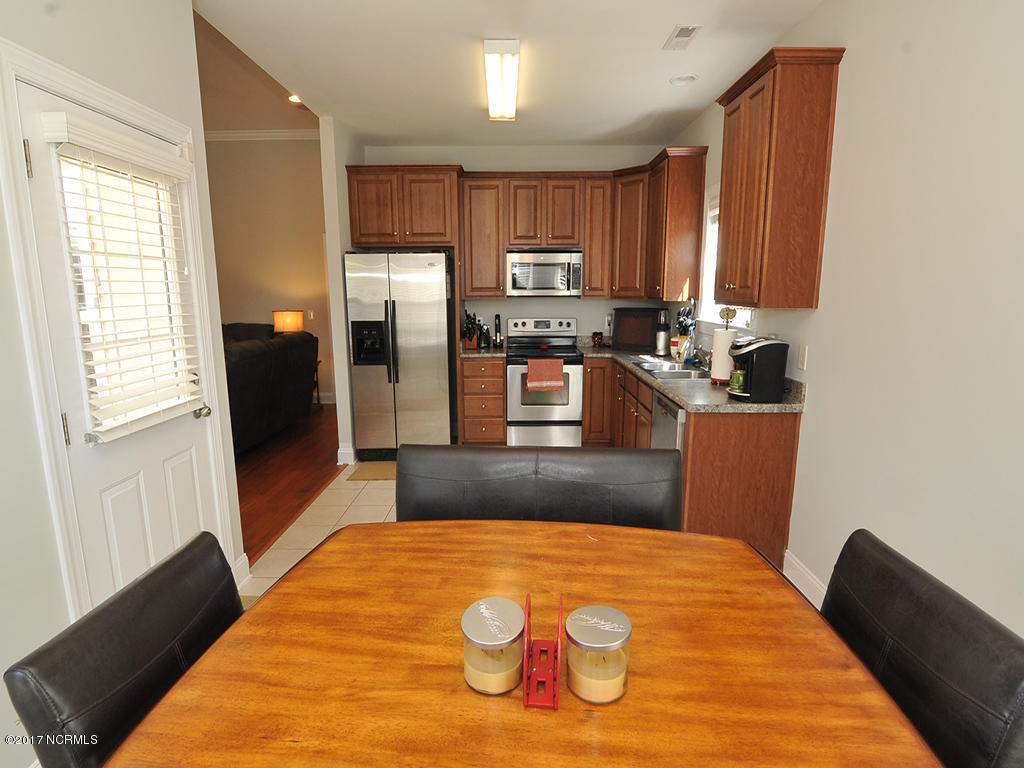 207 Contrail Road Hampstead, NC 28443 - Photo 9 of 21 207 Contrail-Kitchen and Dining