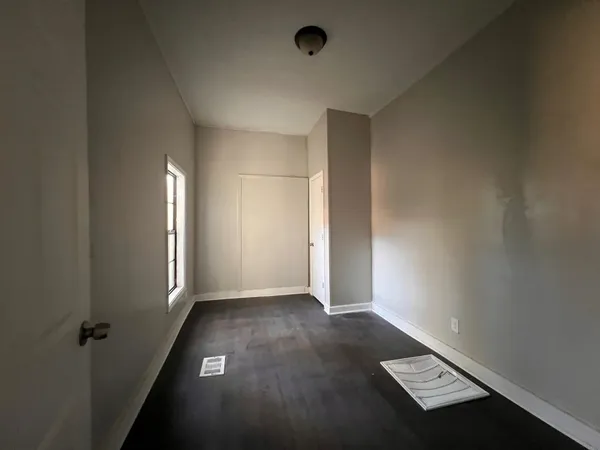 an empty room with windows