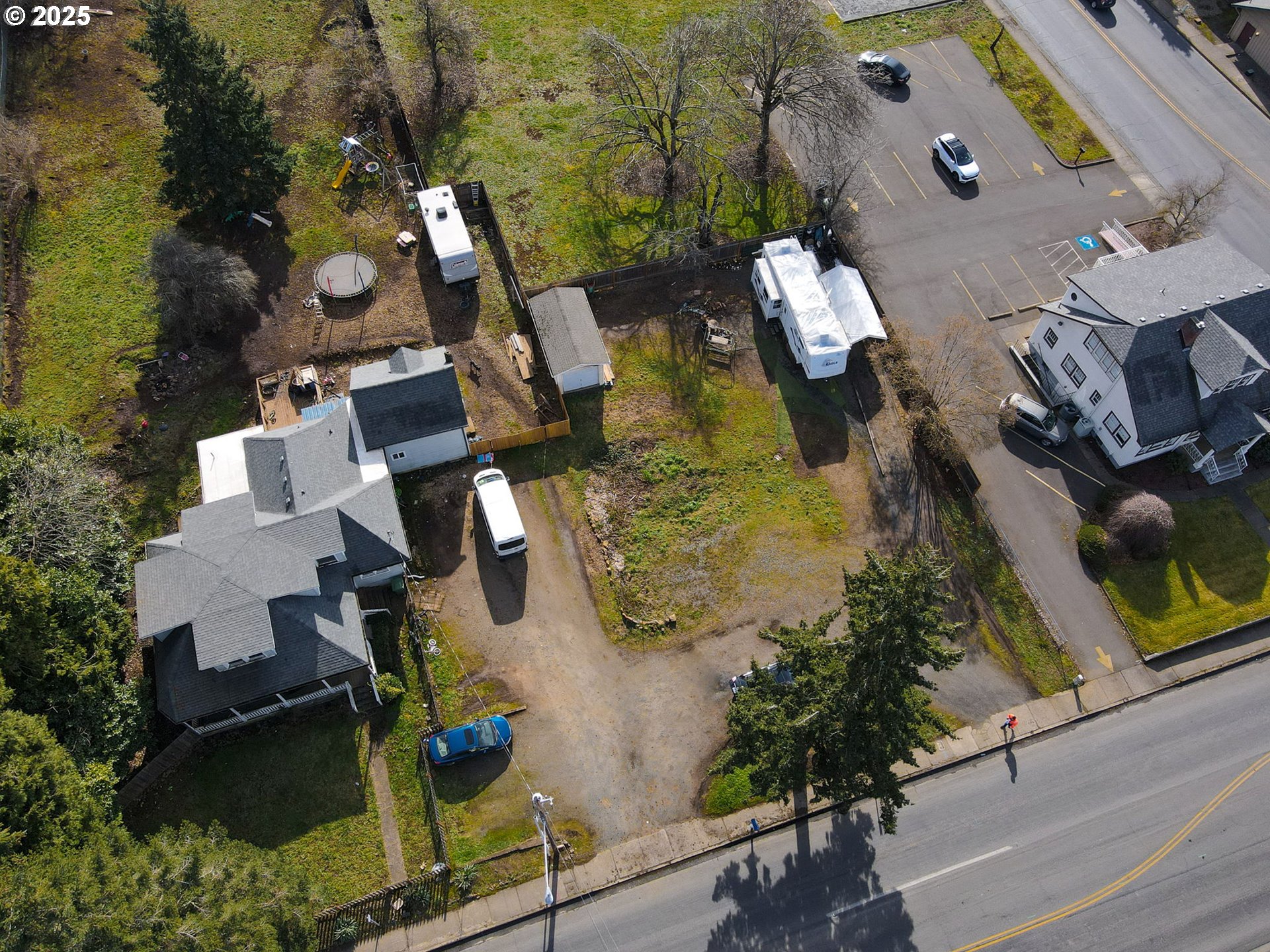 1827 East Main Street Cottage Grove, OR 97424 - Photo 3 of 5 an aerial view of house with yard swimming pool and outdoor seating