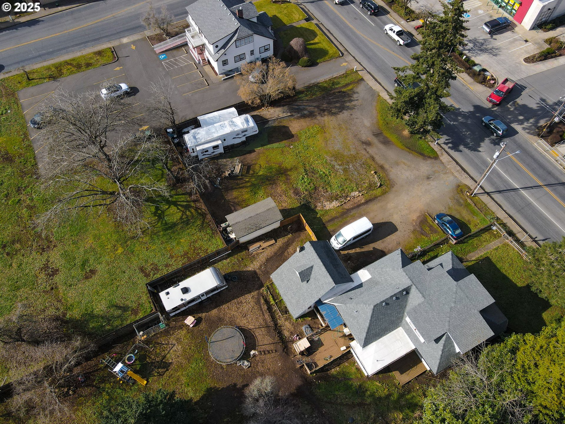 1827 East Main Street Cottage Grove, OR 97424 - Photo 4 of 5 an aerial view of residential house with outdoor space