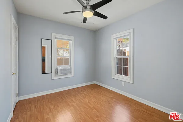 a view of an empty room with a window