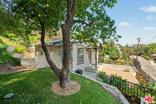 a view of a park with a slide