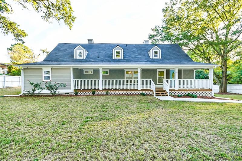 3700 Bakers Ferry Road Southwest Atlanta, GA 30331 - Photo 1 of 1 a view front of house with a garden