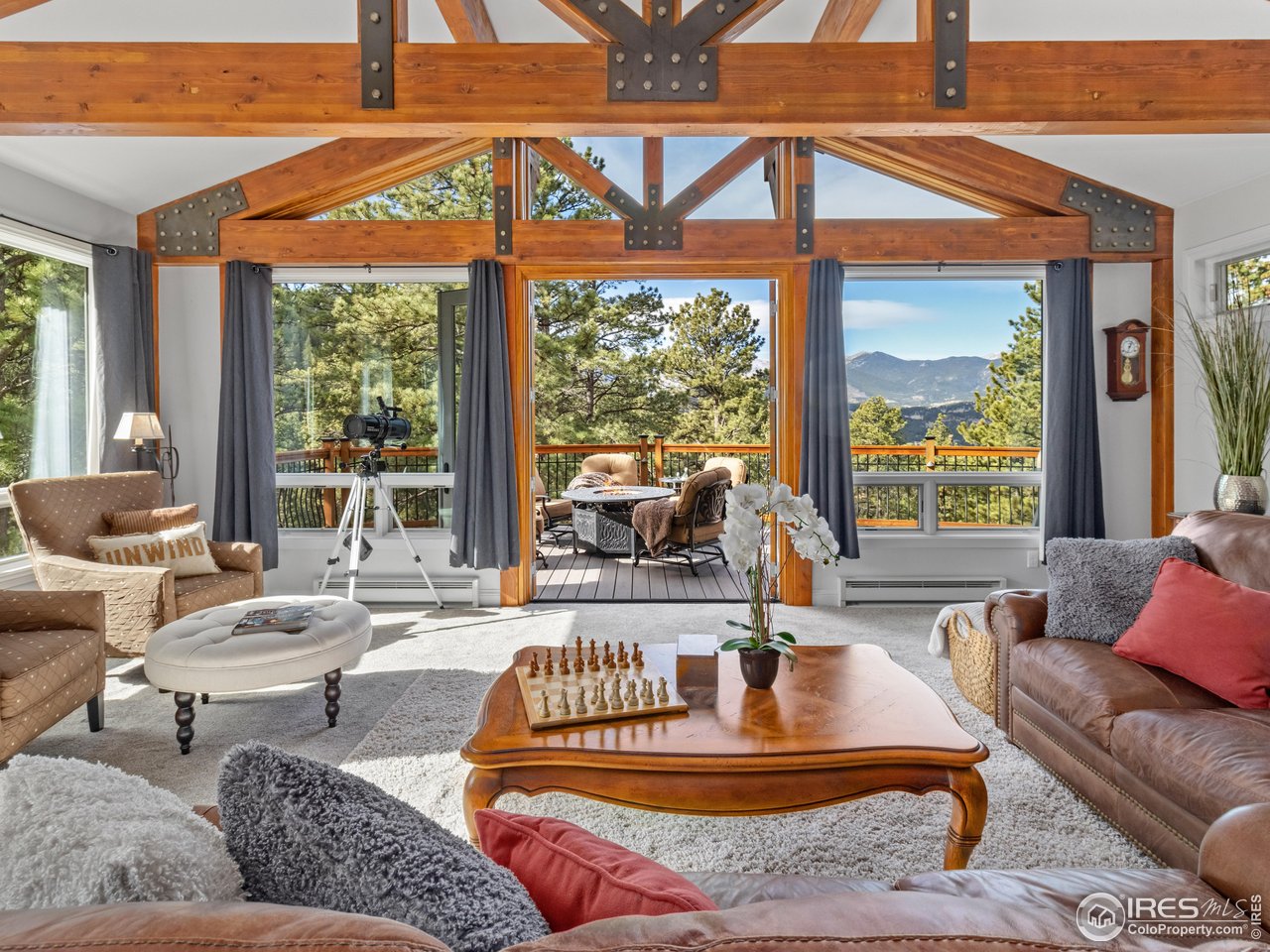 1267 Upper Venner Road Estes Park, CO 80517 - Photo 11 of 44 All Pella WIndows are double-pane with UV protection for comfort and efficiency. Heated floors in Bathrooms, Kitchen and Hallways add premium warmth.