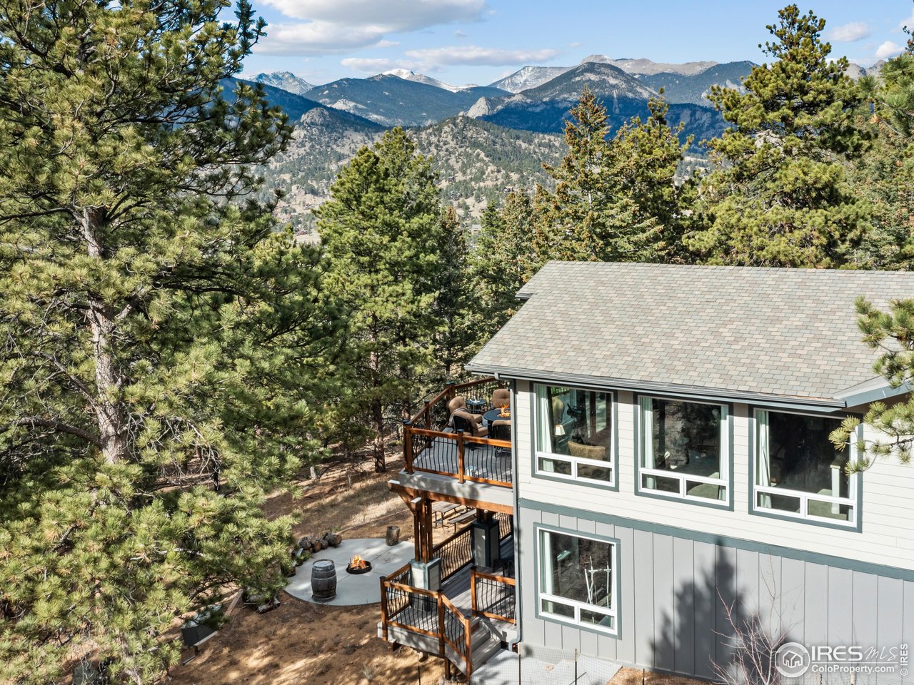 1267 Upper Venner Road Estes Park, CO 80517 - Photo 31 of 44 an aerial view of a house with a yard and balcony