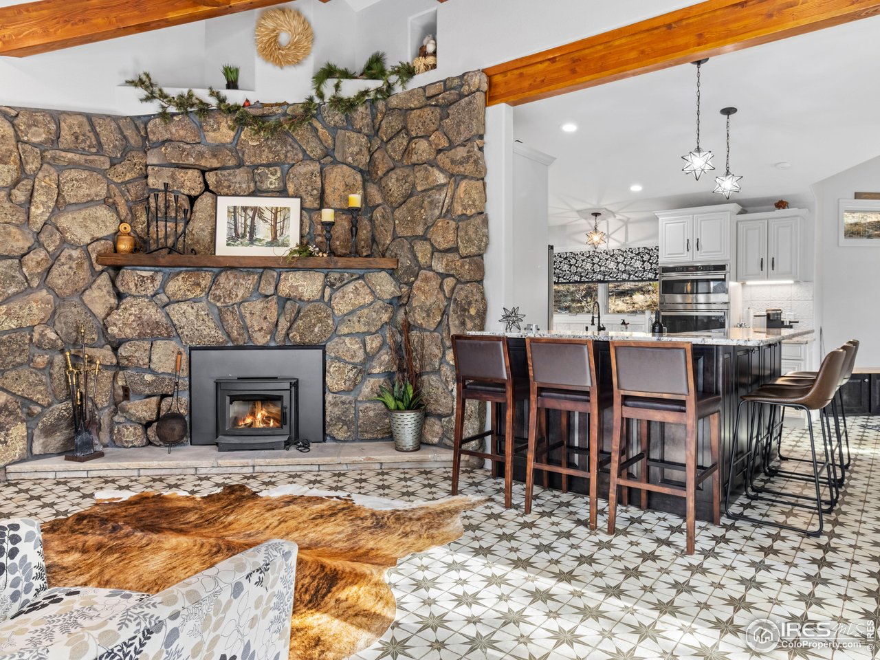 1267 Upper Venner Road Estes Park, CO 80517 - Photo 8 of 44 Sitting or Dining Area - you choose. Elegance meets modern rustic vibes.